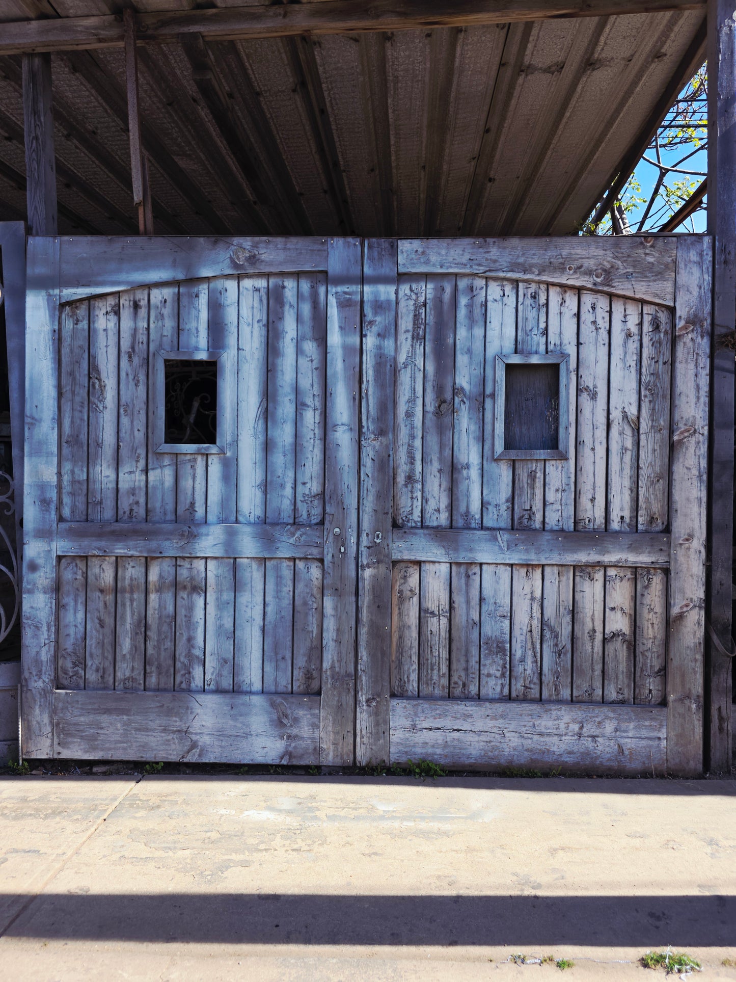 Rustic Aged Cedar Door – A Threshold of Strength and Tradition